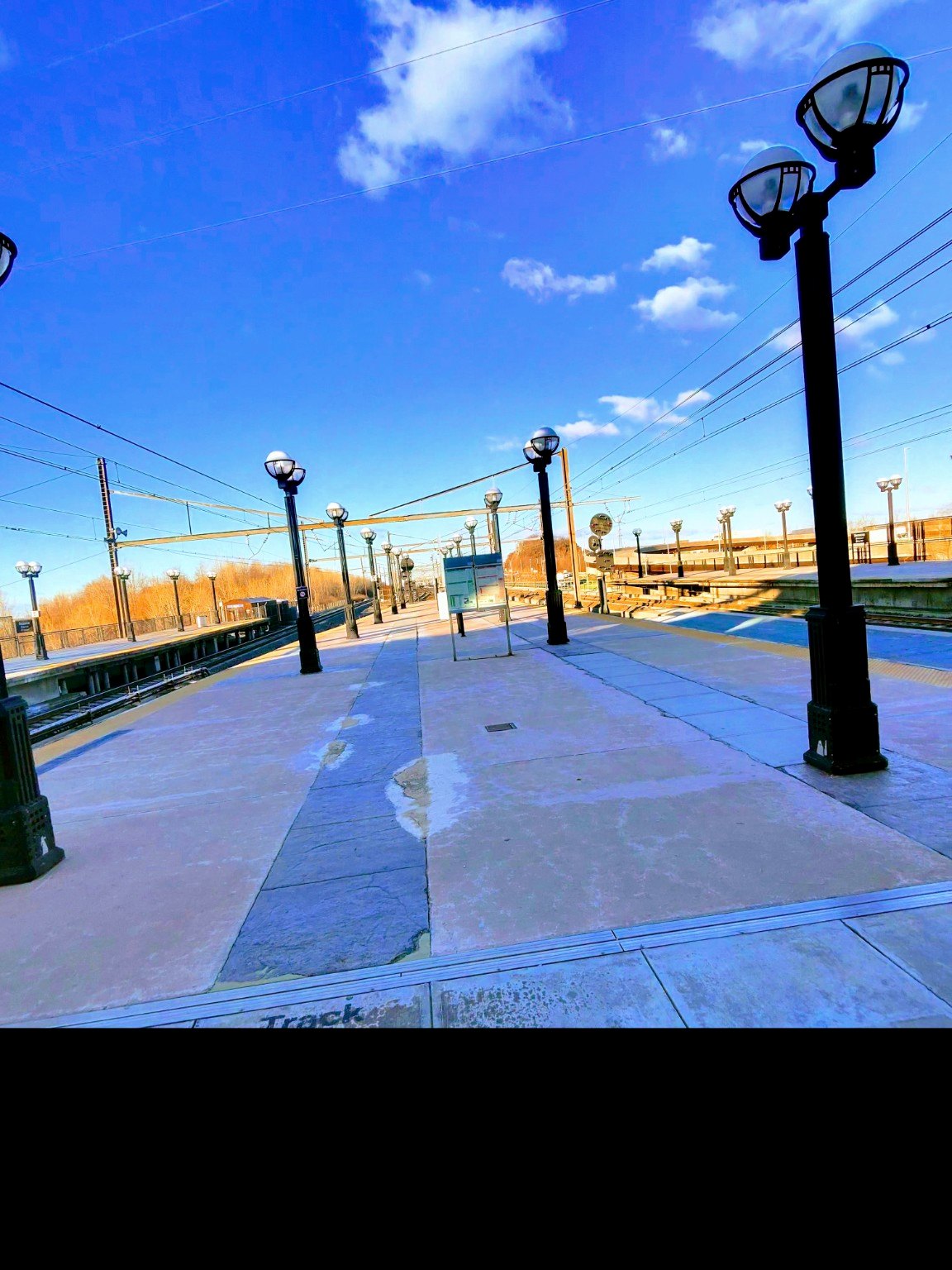 Train platform with blue sky